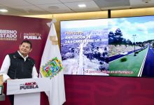 Gobernador Alejandro Armenta anunciando convenio con PEMEX para pavimentación de calles en Puebla.